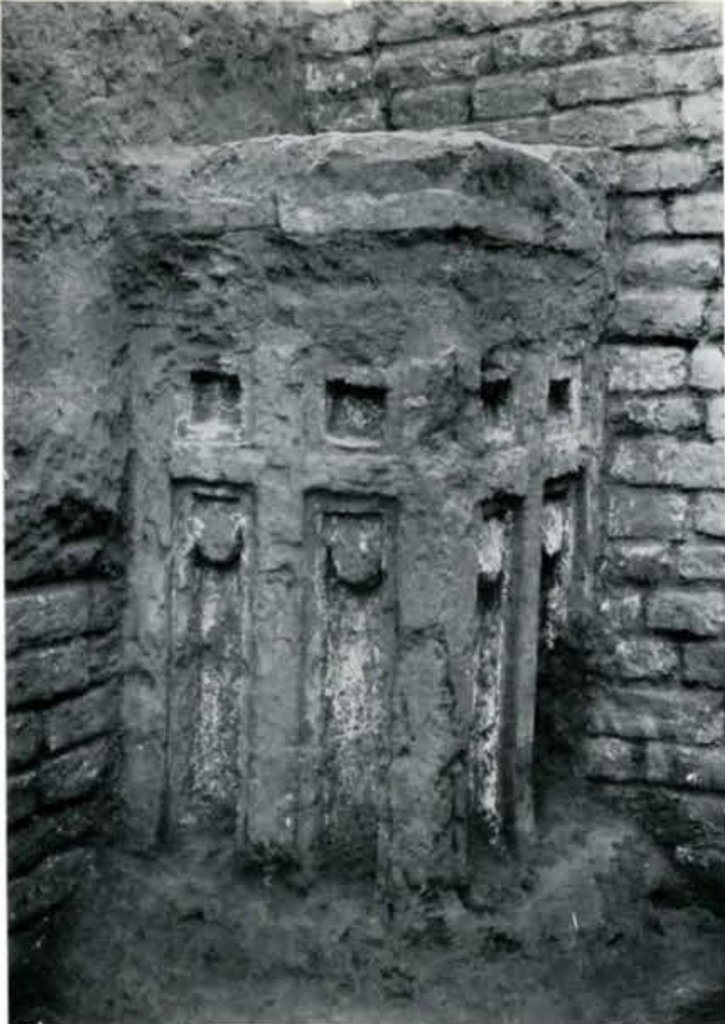 An excavated paneled pillar