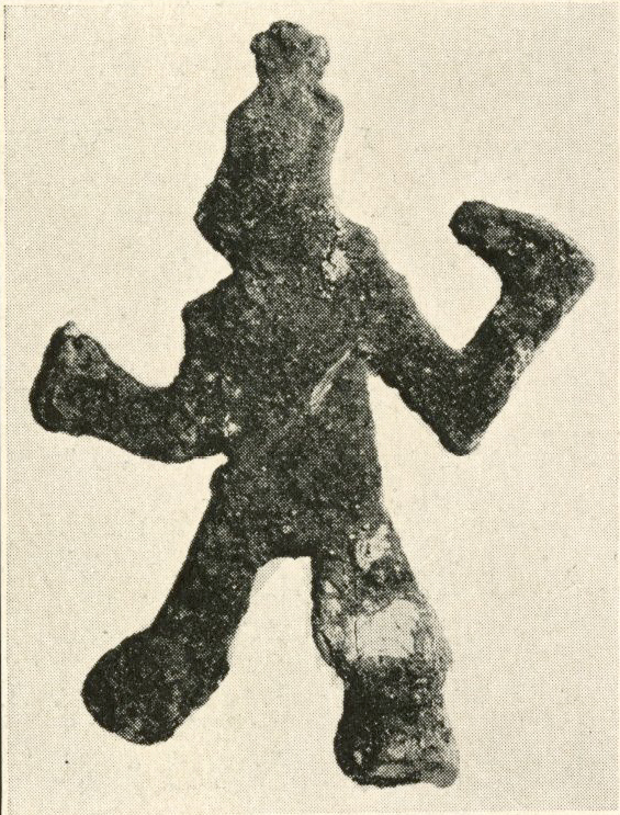 Crude bronze humanoid figure