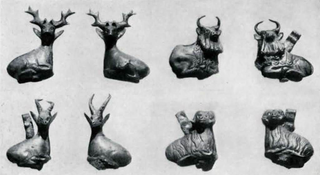 Eight small animal ornaments in pairs