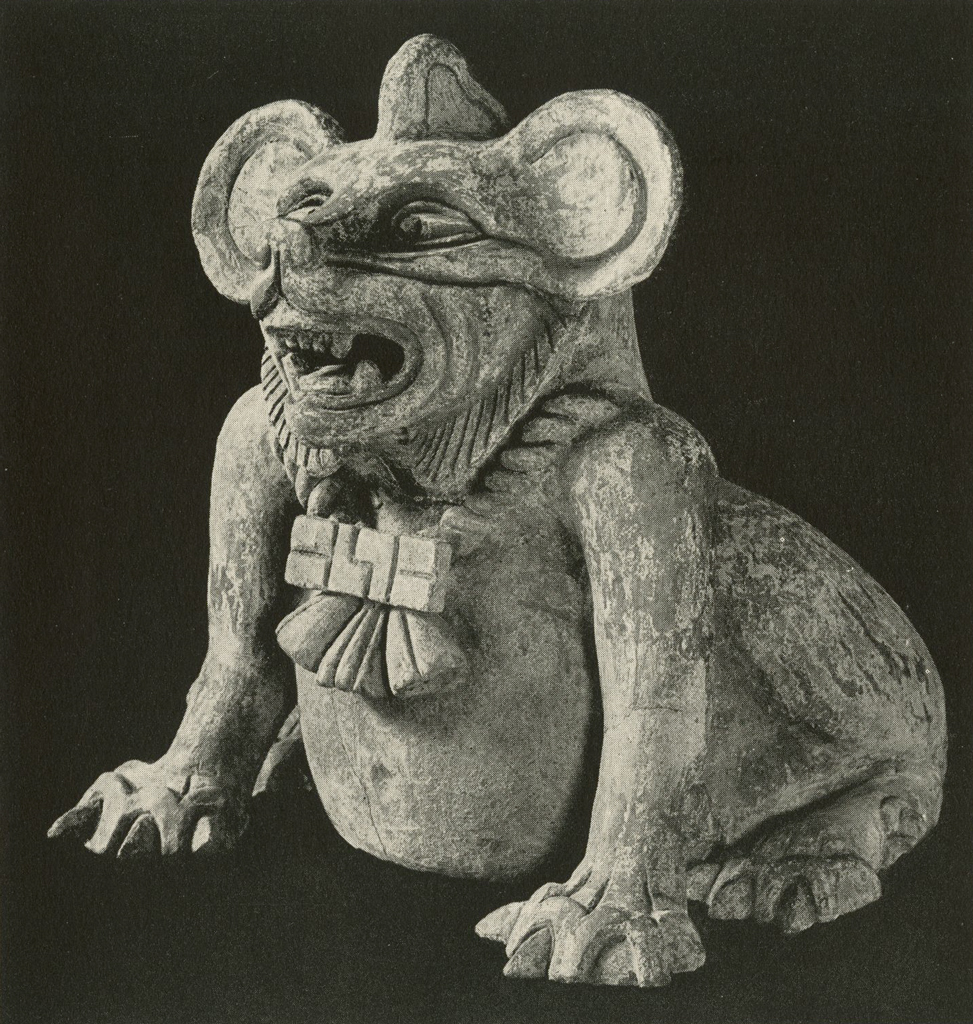 Effigy urn in the shape of a seated animal, with its mouth open