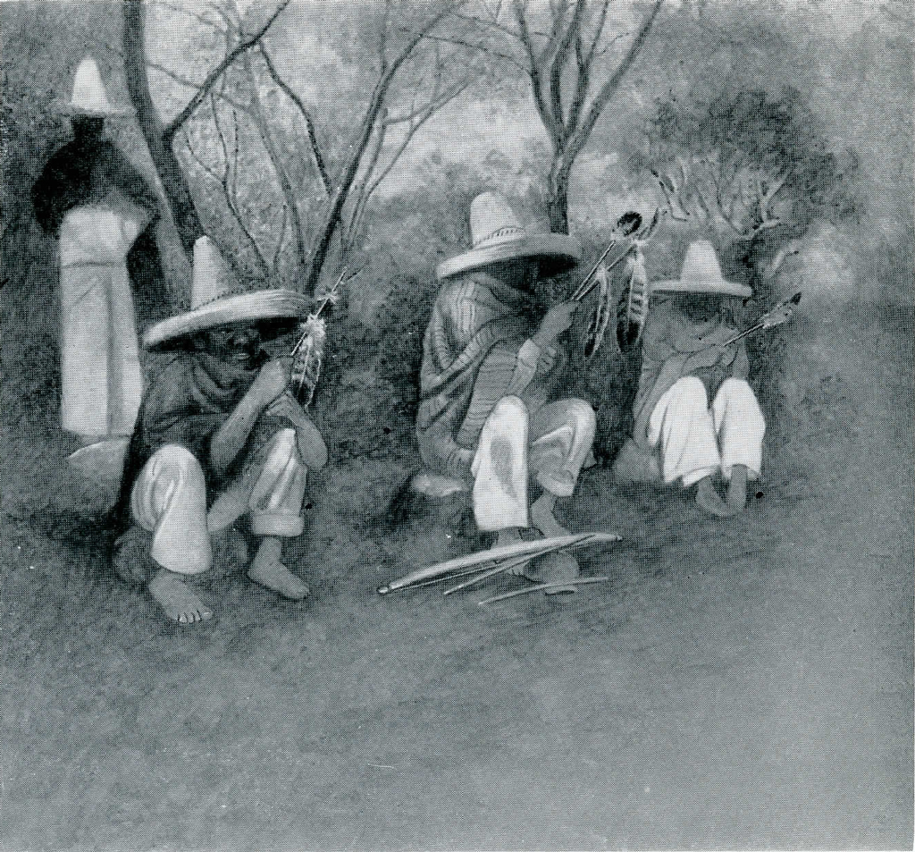 Three men sitting on rocks or stumps holding feathered ceremonial arrows